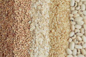 Picture of rice, beans and grains arranges in vertical stripes