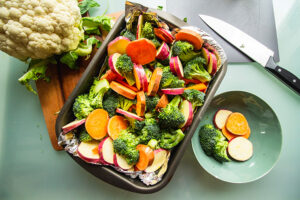 Fresh vegetables in a roasting pan